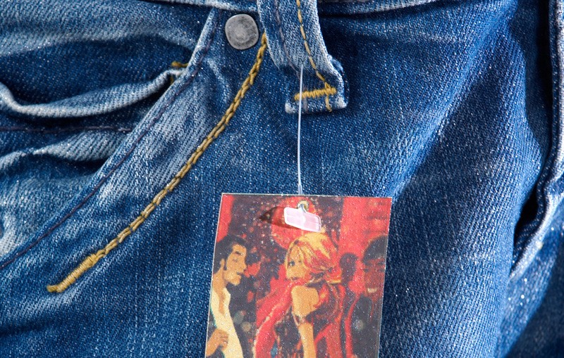 Swiftach Fastener & Tag attached to denim jeans