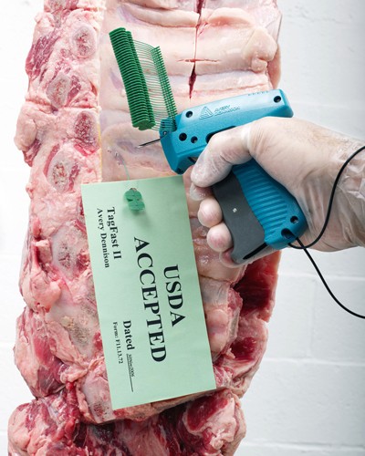 Tag Fast Tool attaching tag to meat
